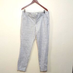 SLIGHTLY USED CALVIN KLEIN SIZE 14 COLOR GRAY AND WHITE HAS 4 POCKETS